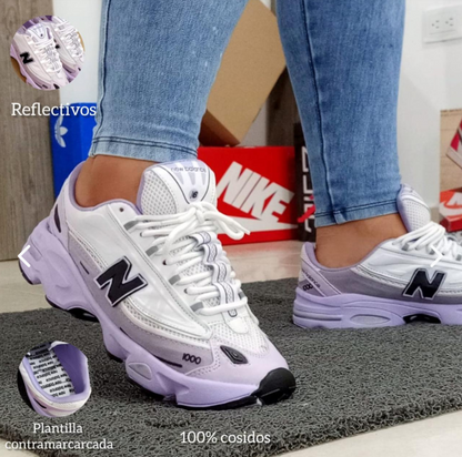 Tenis New Balance 1000 Gris: Comodidad Urbana para Dama - vista frontal